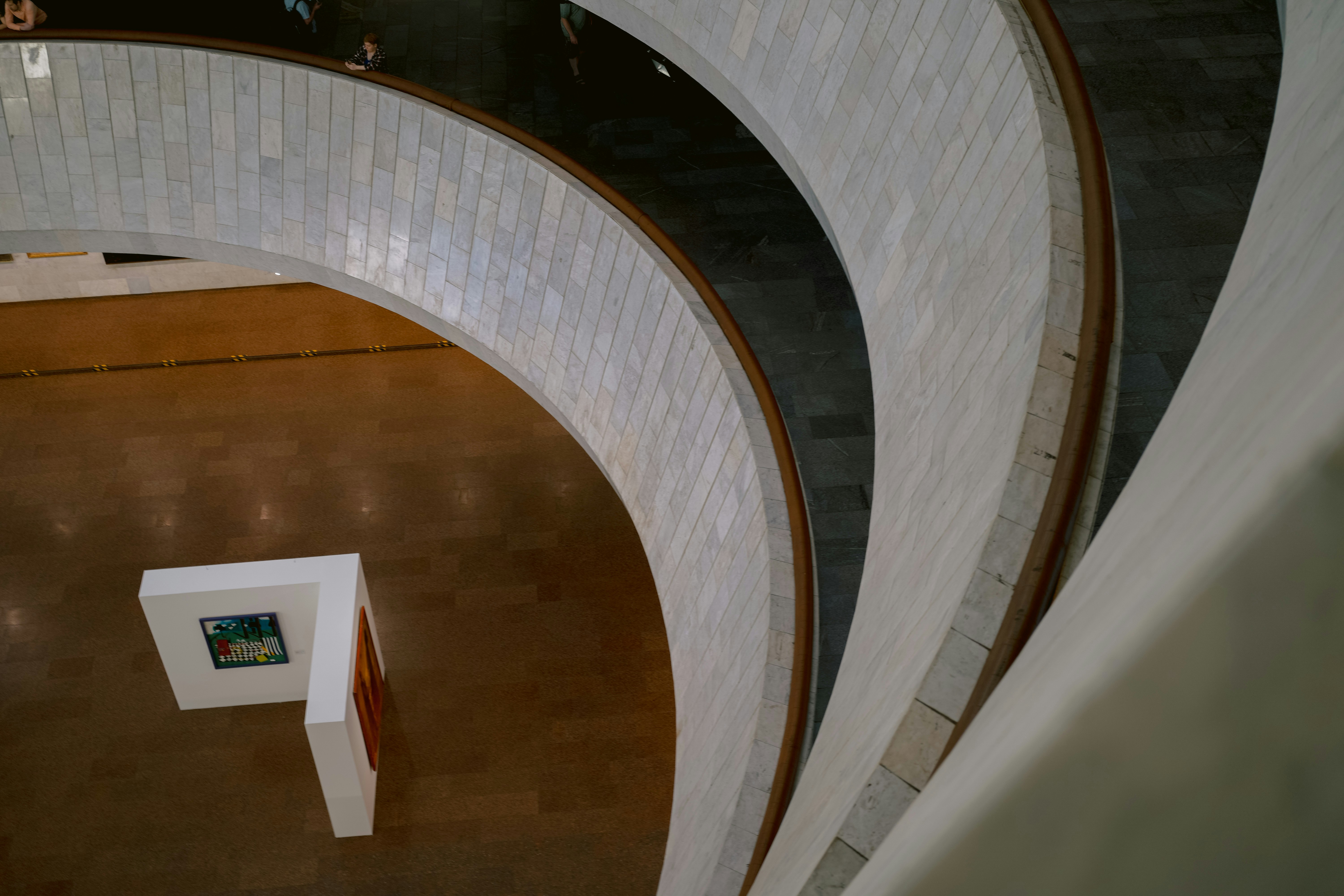 an overhead view of a building with a sculpture in the center