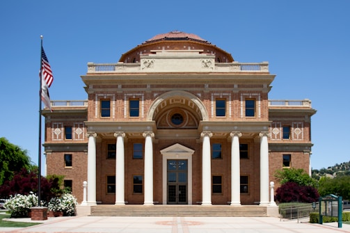 a large building with a flag on top of it