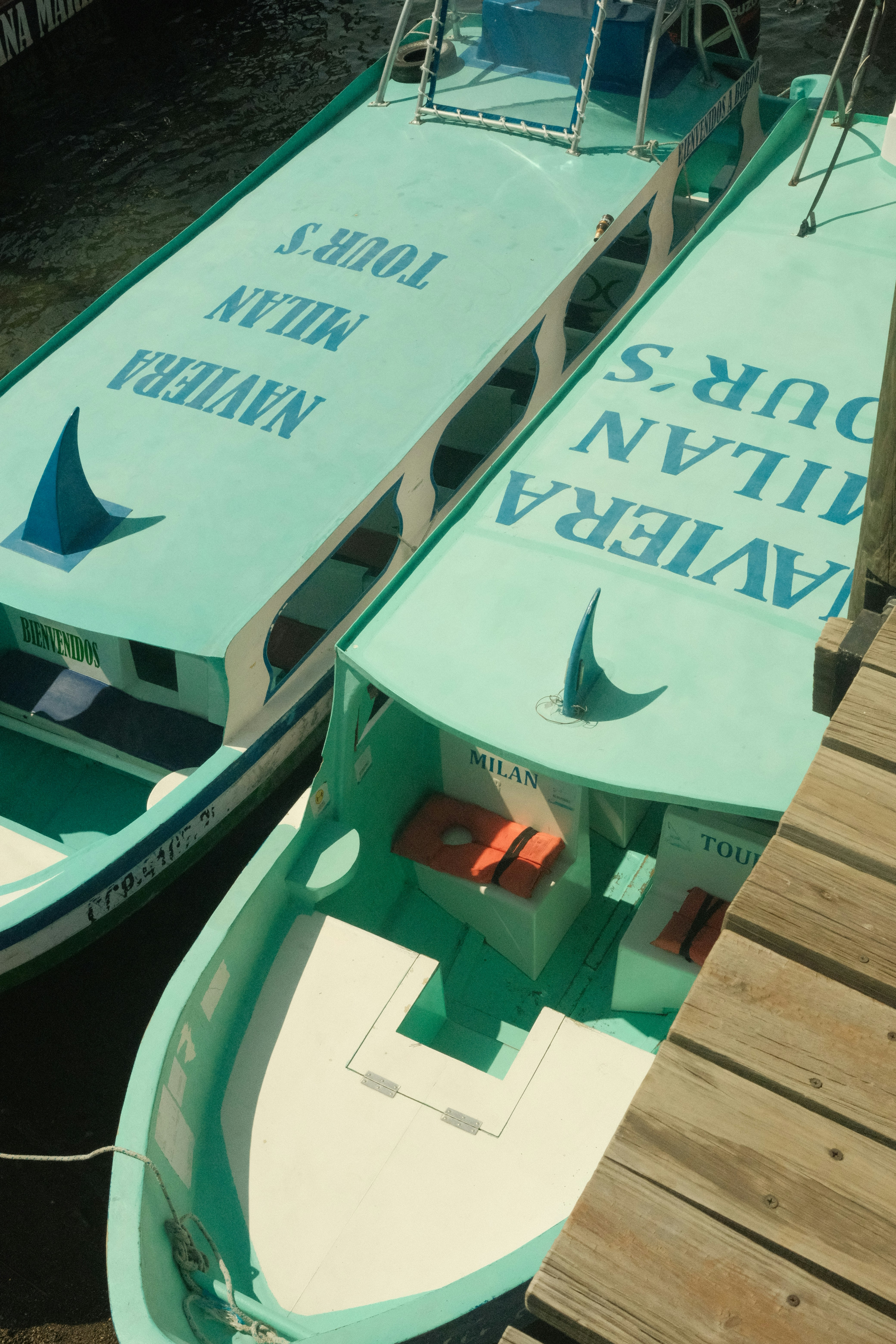 a couple of boats that are sitting in the water