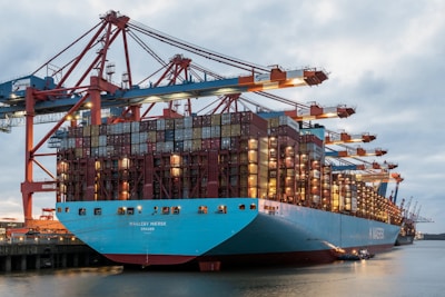 a large blue and red ship in the water