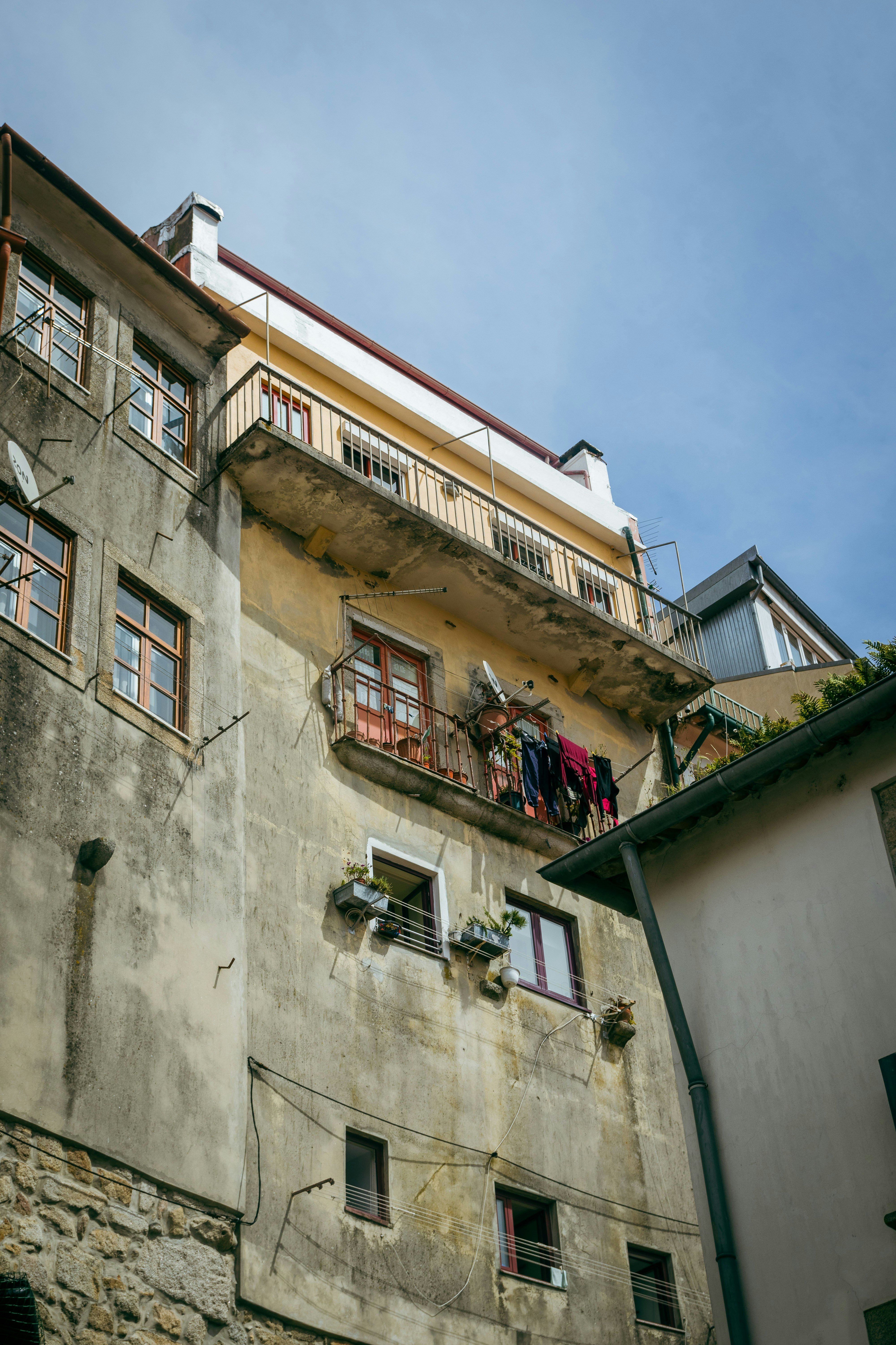 an old building with a balcony and balconies