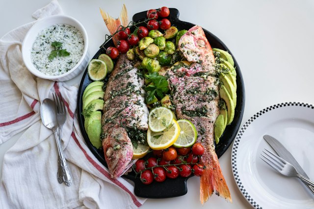 Whole baked fish with lemon and herbs