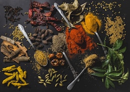 a table topped with different types of spices