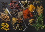 a table topped with different types of spices