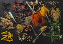 a table topped with different types of spices