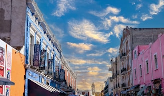 a city street filled with lots of tall buildings