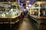 a restaurant filled with lots of tables and chairs