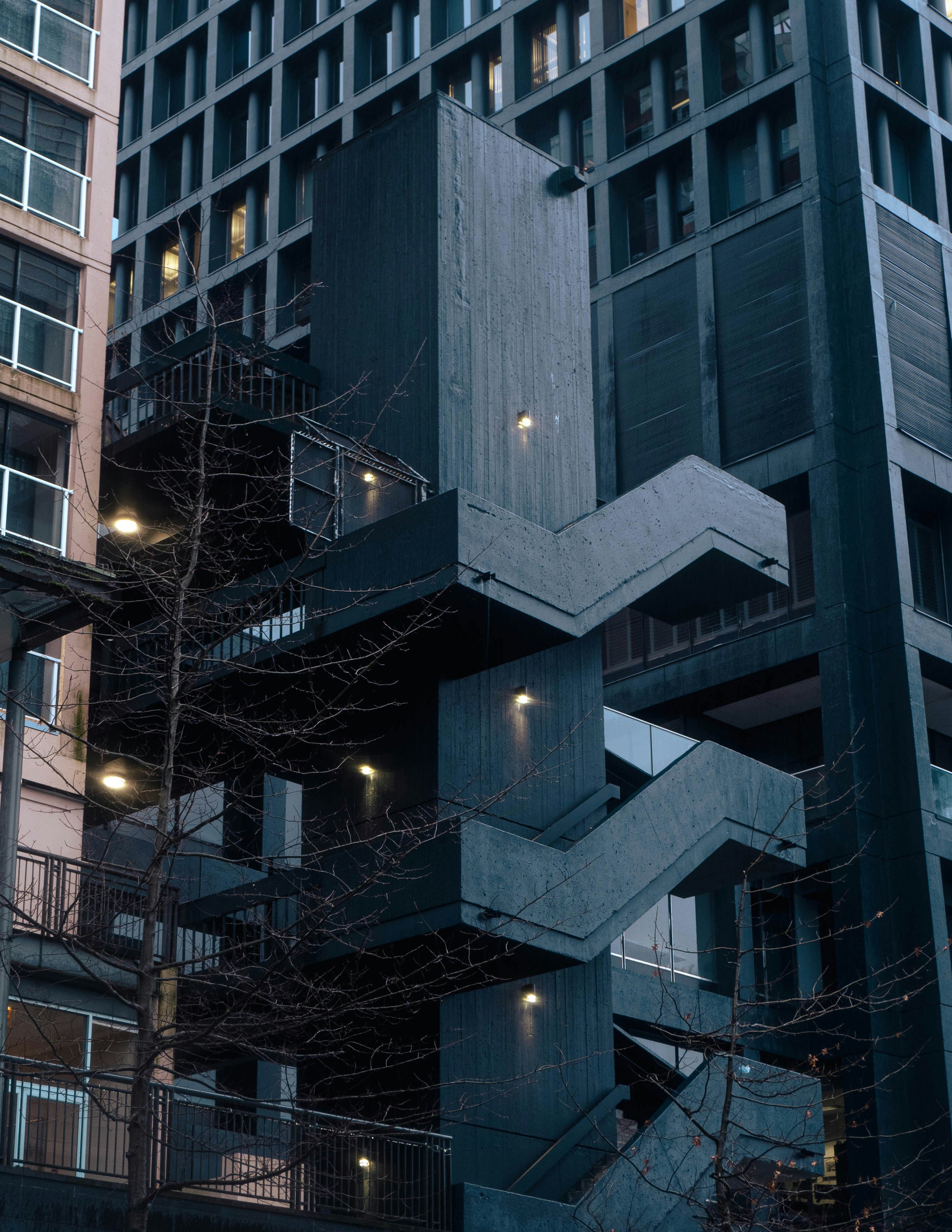 a very tall building with a bunch of balconies