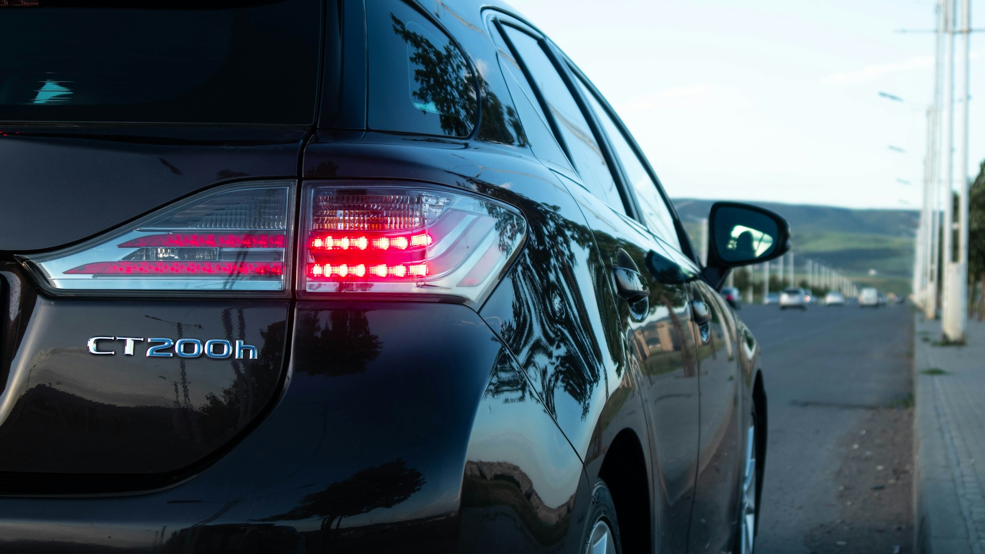 a close up of a car parked on the side of the road