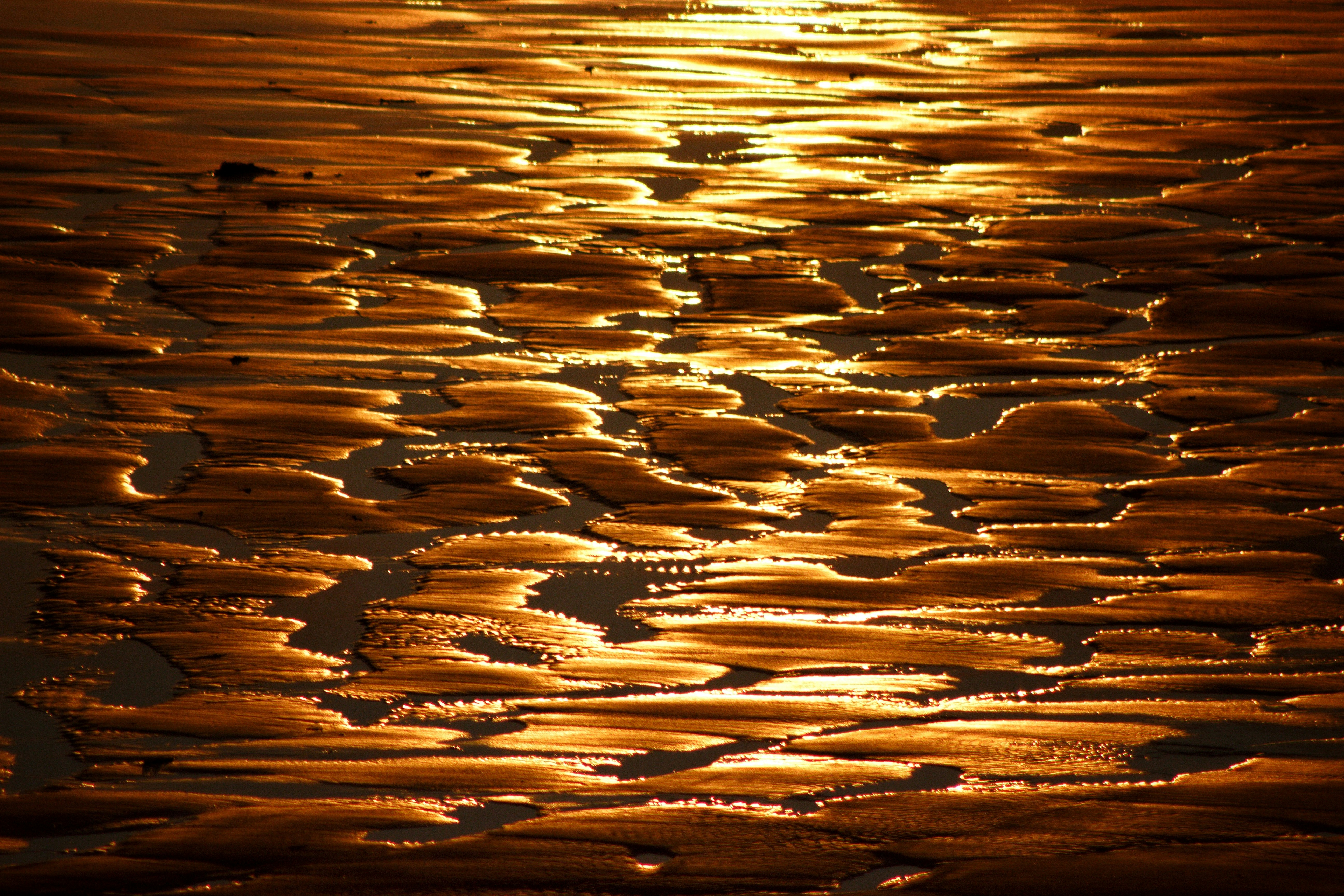 Reflets sur le sable