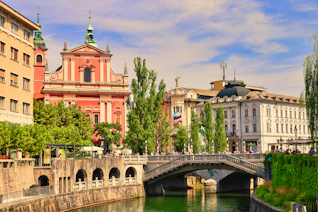 a bridge over a body of water in a city