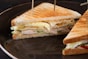 a sandwich cut in half on a plate