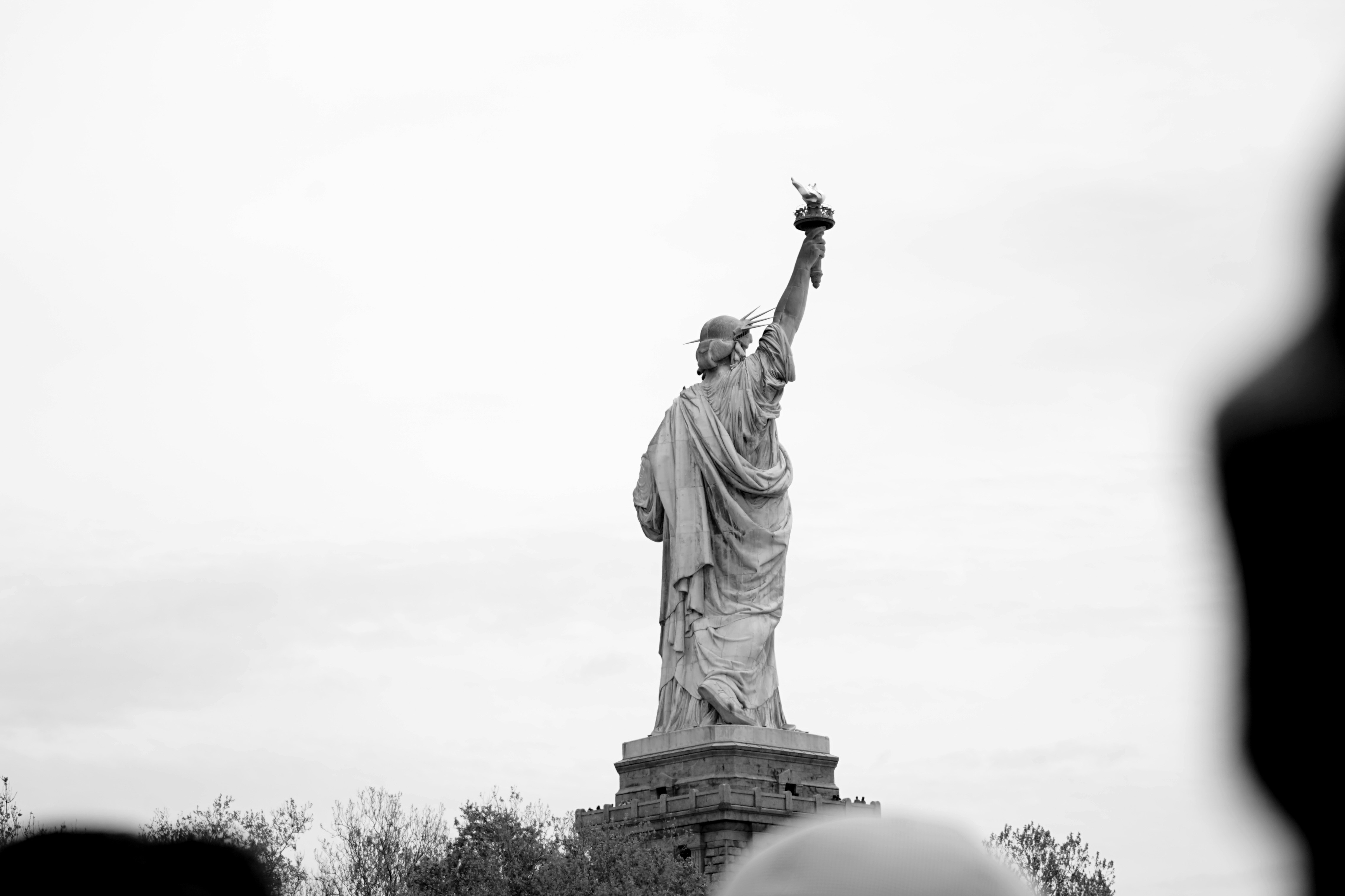 a black and white photo of the statue of liberty