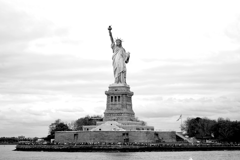 a black and white photo of the statue of liberty