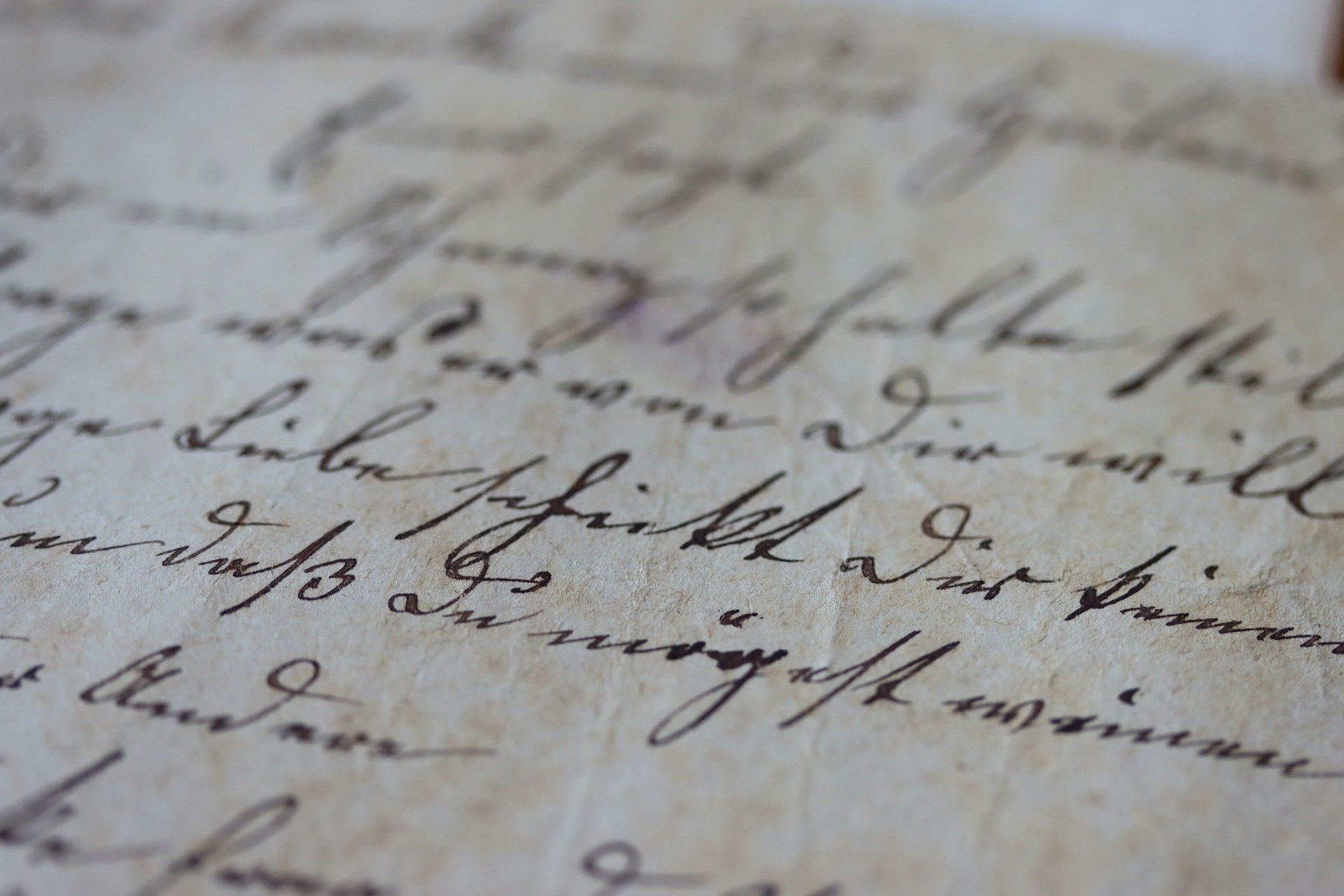 a close up of a handwriting on a piece of paper