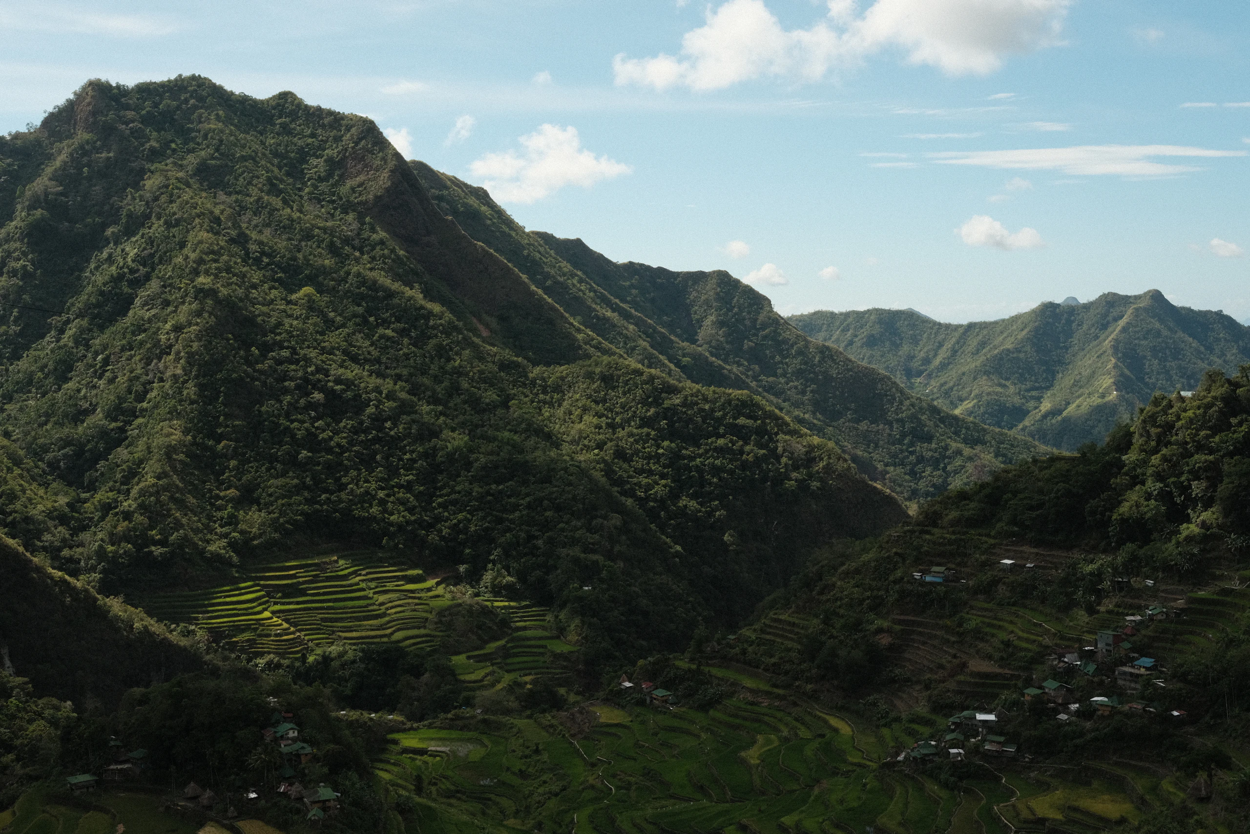 The Batad rice terraces curving around a mountain amphitheatre