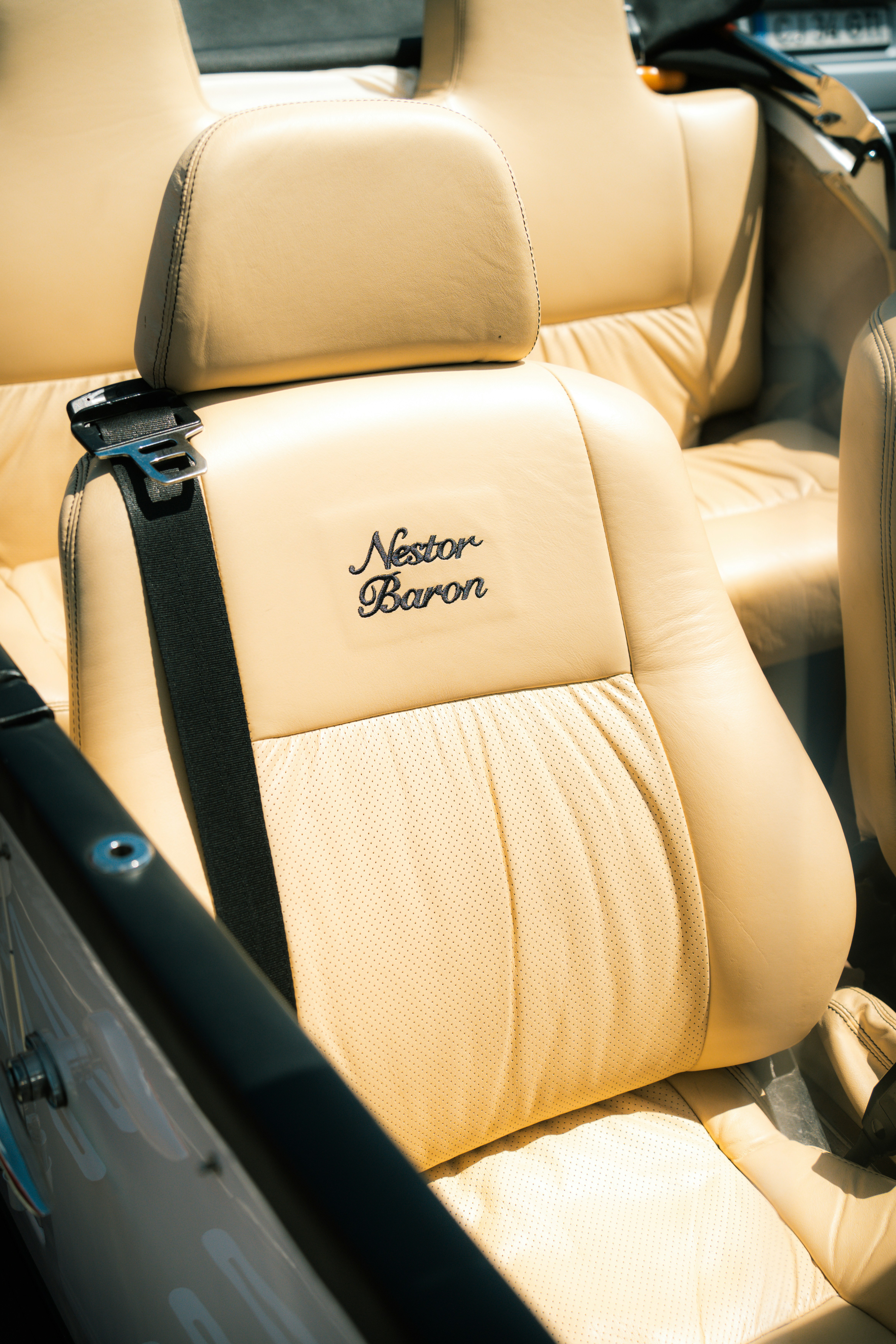 Luxury fleet vehicle interior showing premium leather seats
