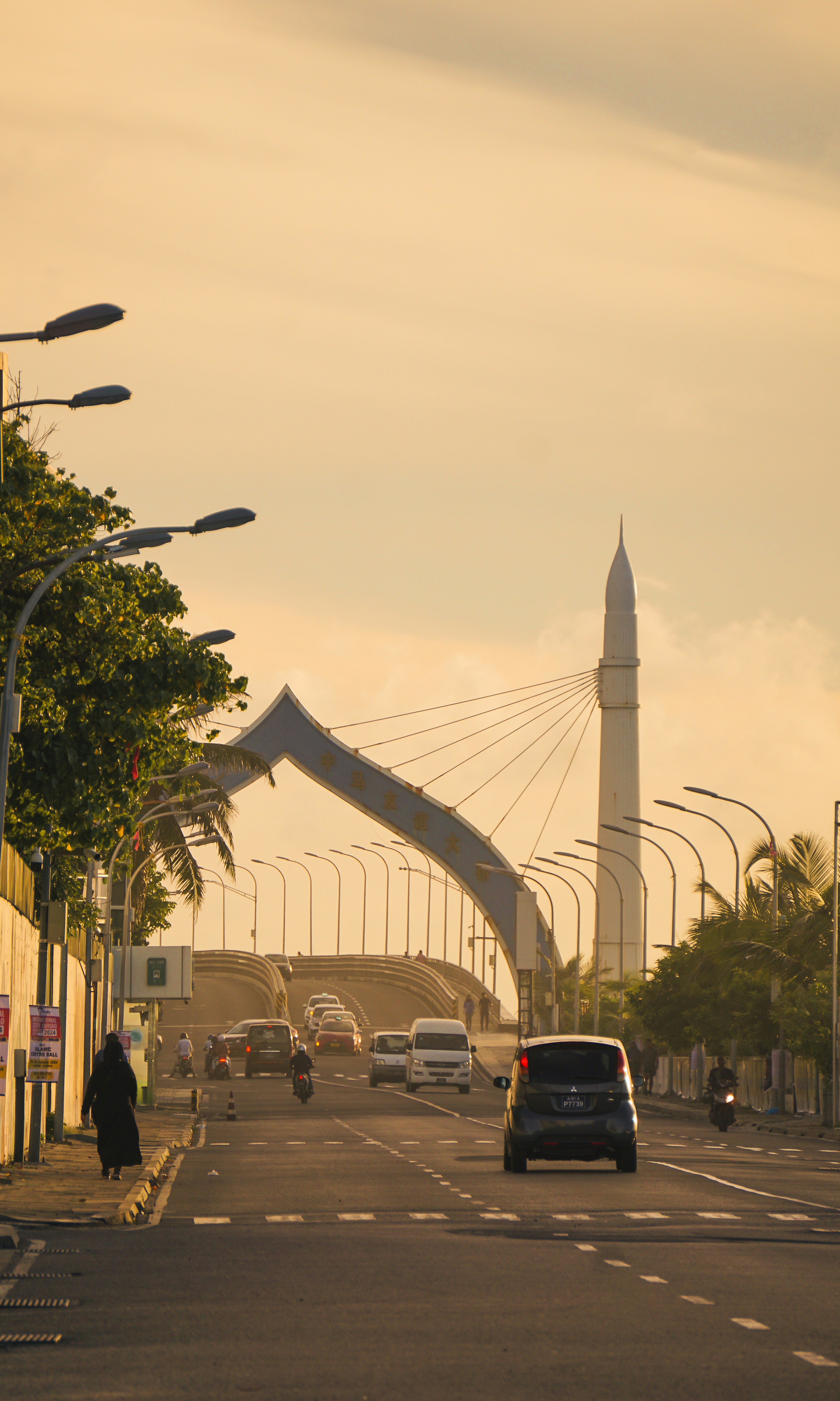 a city street with cars driving on it