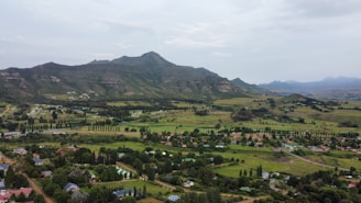 an aerial view of a small town of clerens in the mountains