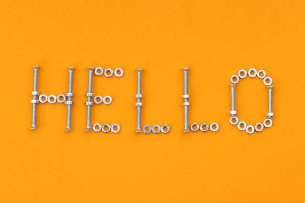 the word hello spelled out in metal parts