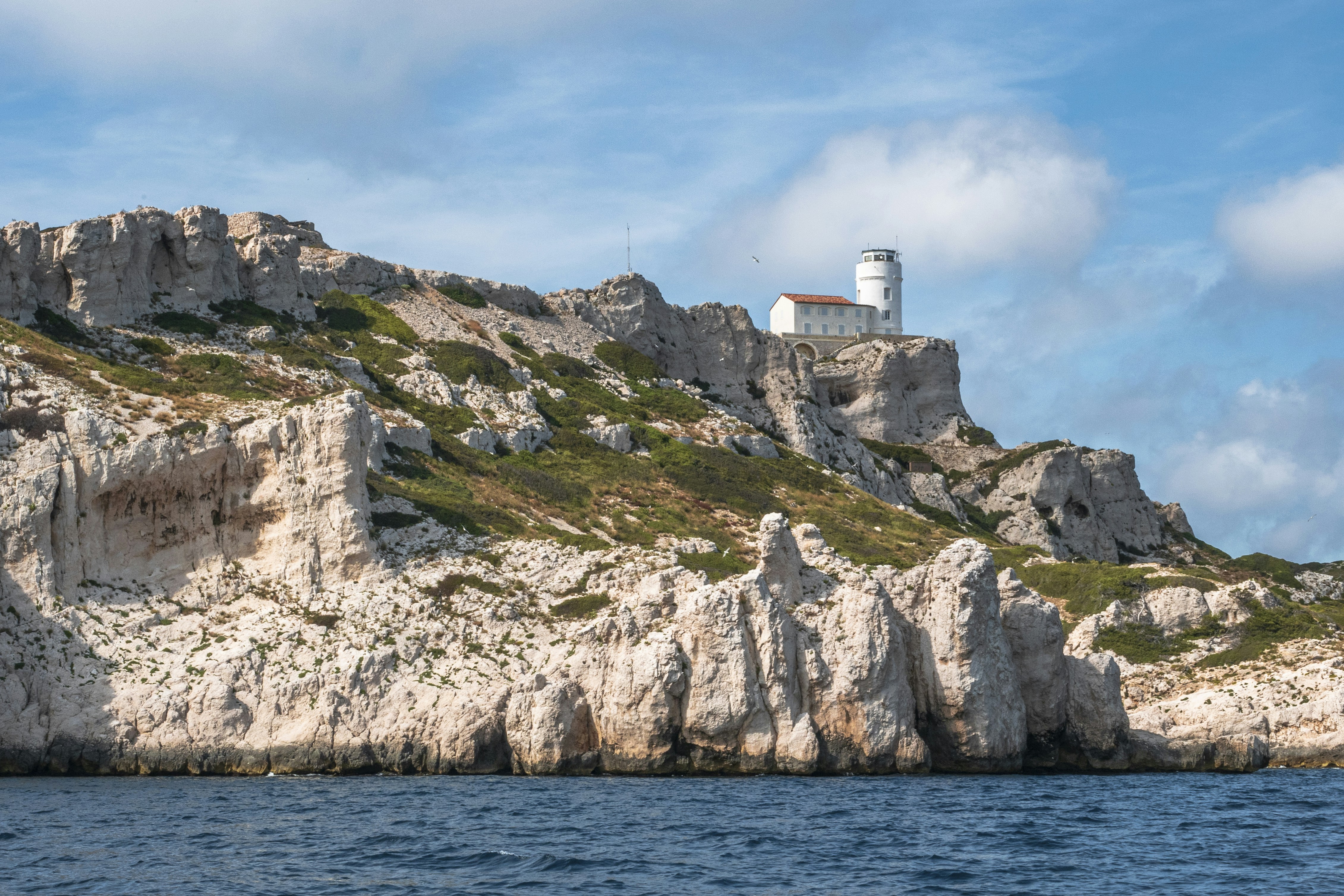 a lighthouse on top of a rocky outcropping, Iles du Frioul