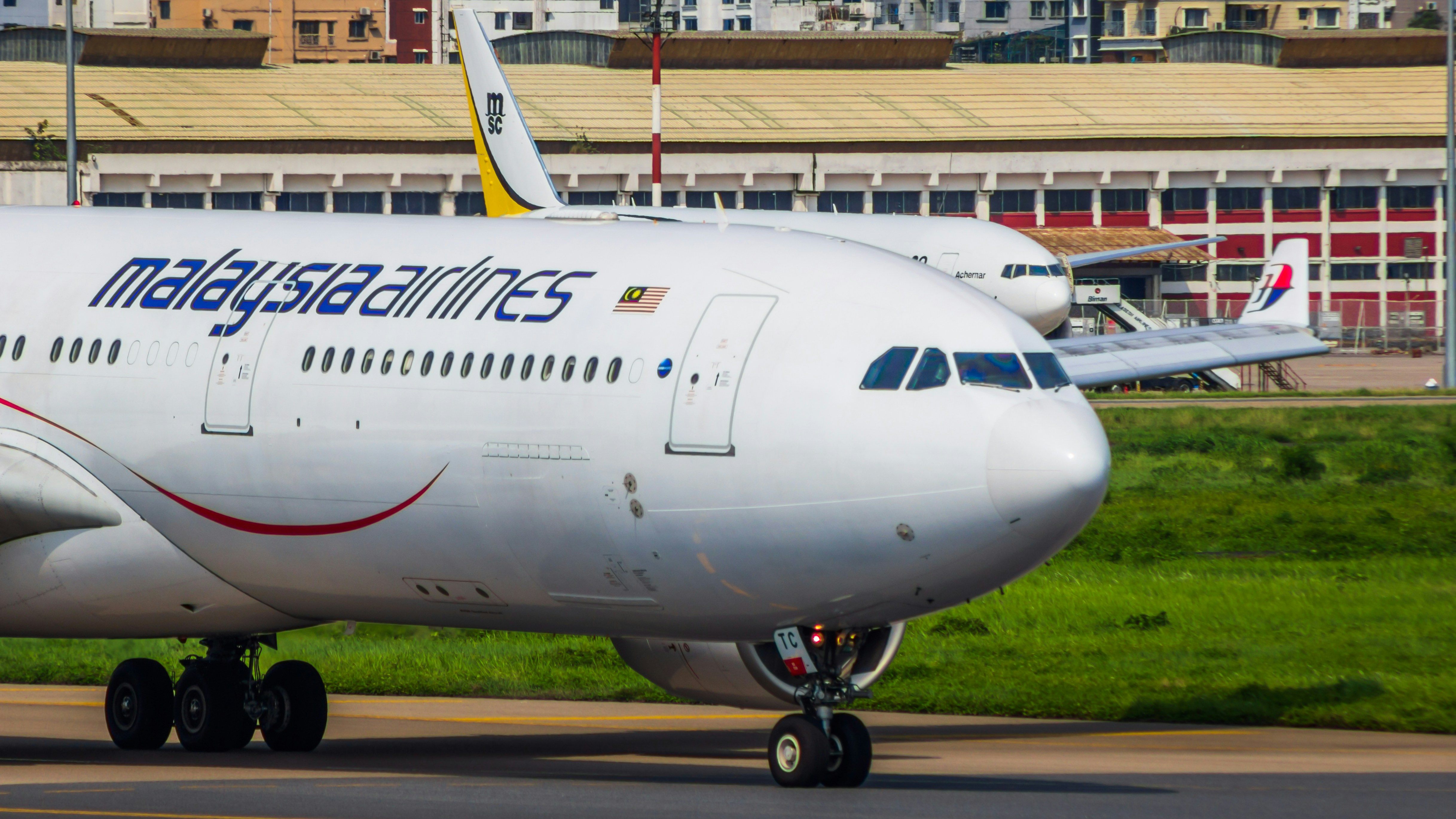Malaysia Airlines aircraft on runway