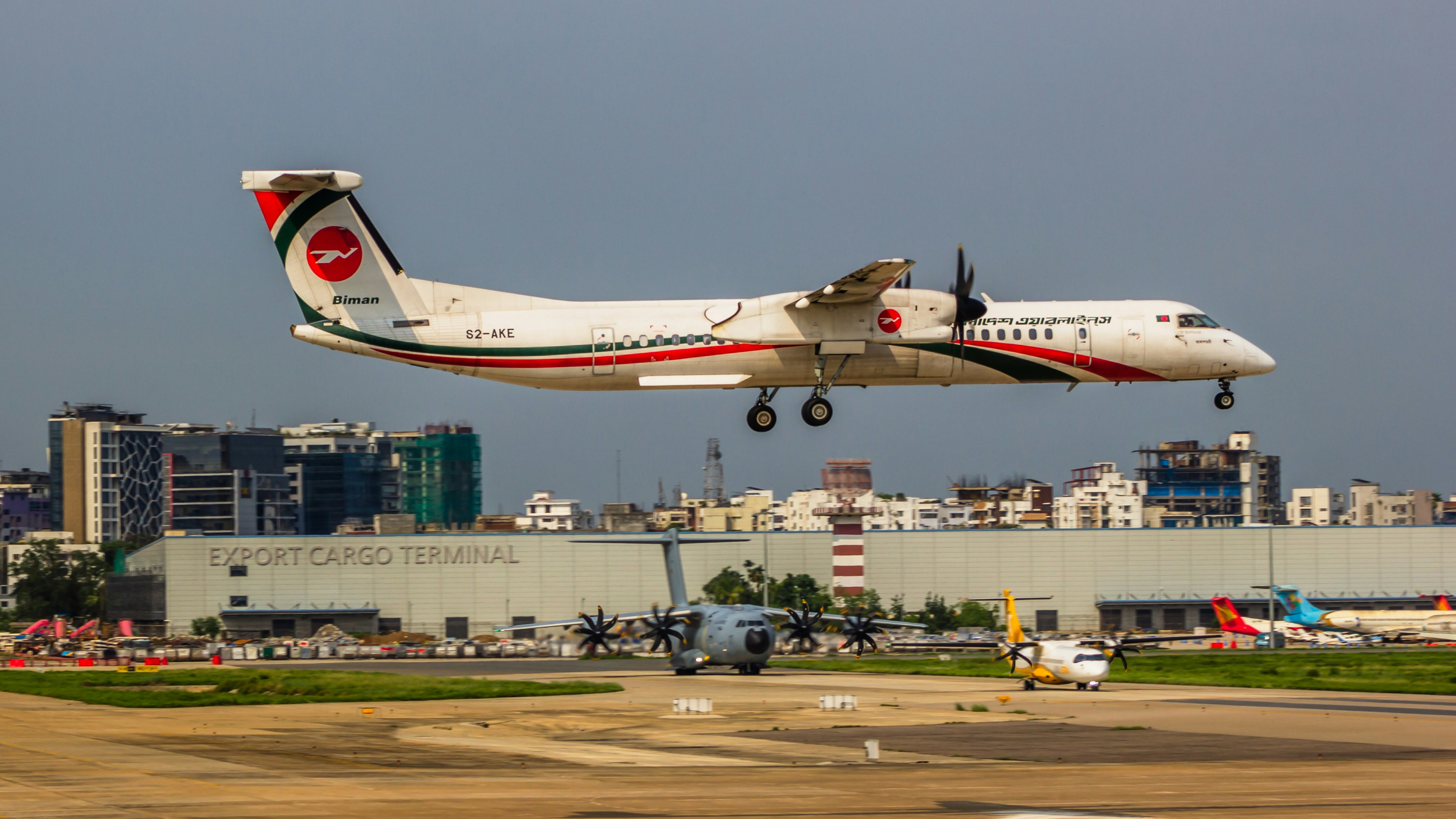 an airplane taking off from an airport runway