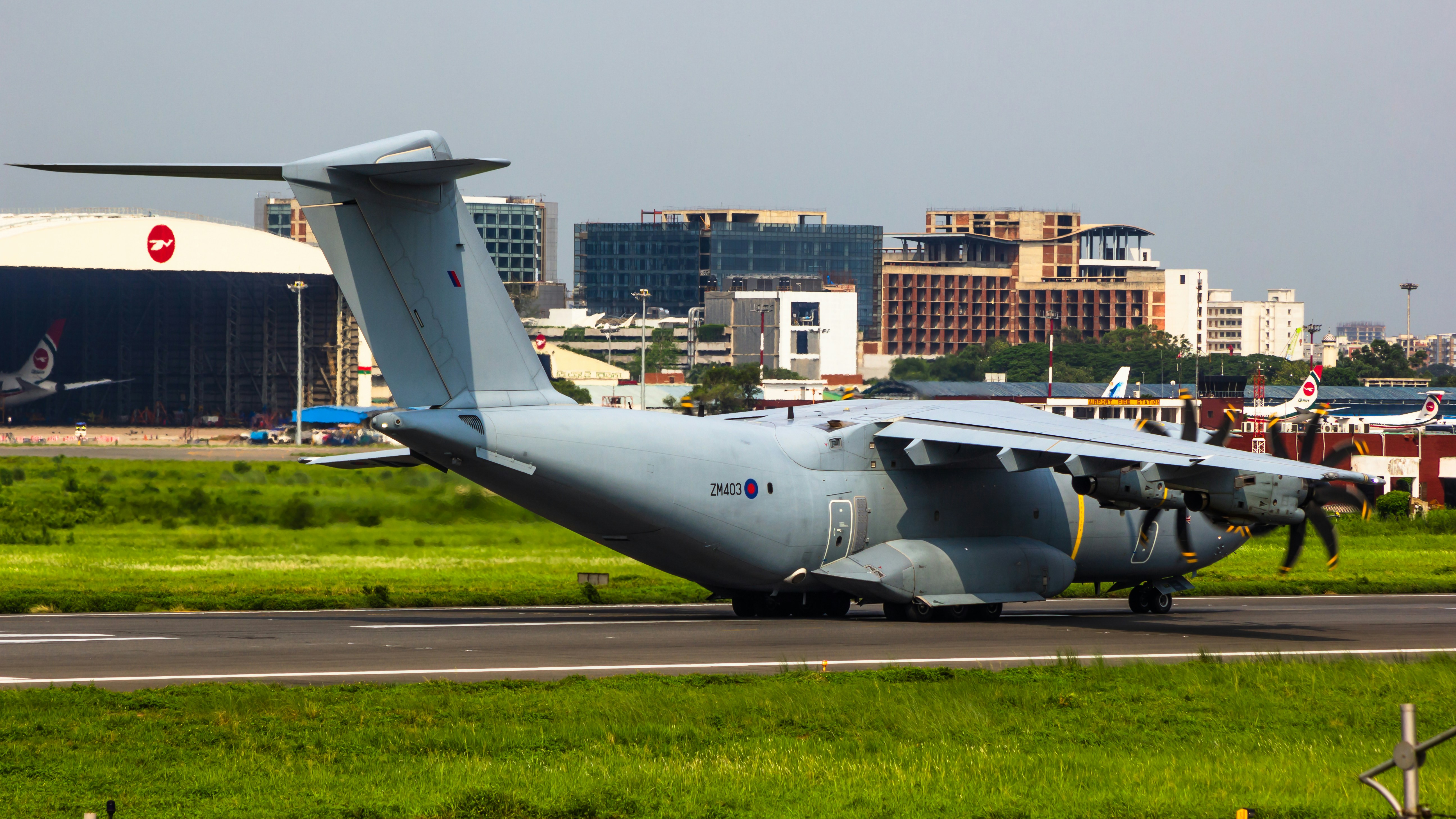 a large air plane sitting on top of an airport runway, RAF Airbus A400M Atlas C1