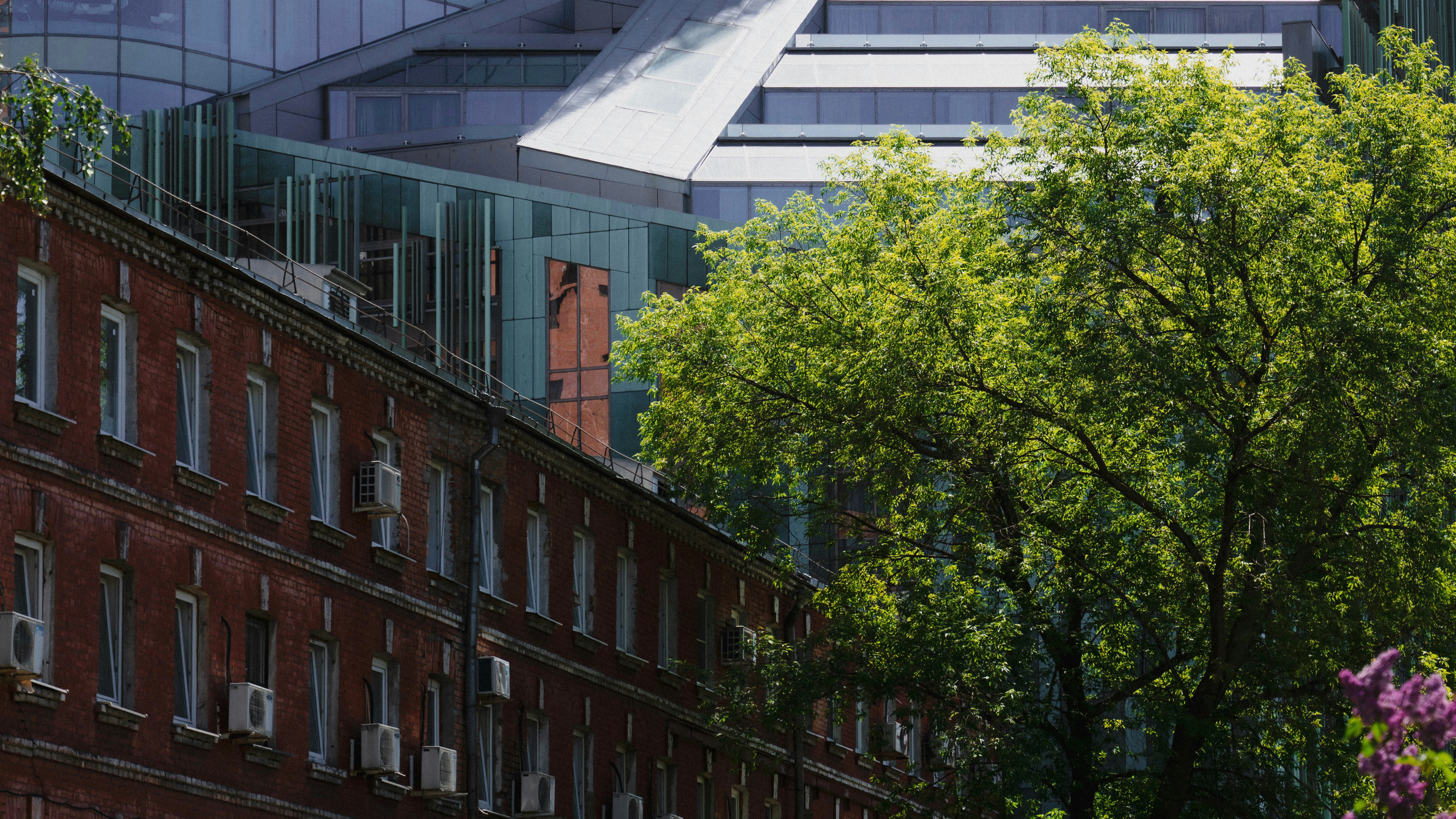 a tall building with a clock on the side of it
