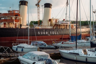 a group of boats that are sitting in the water