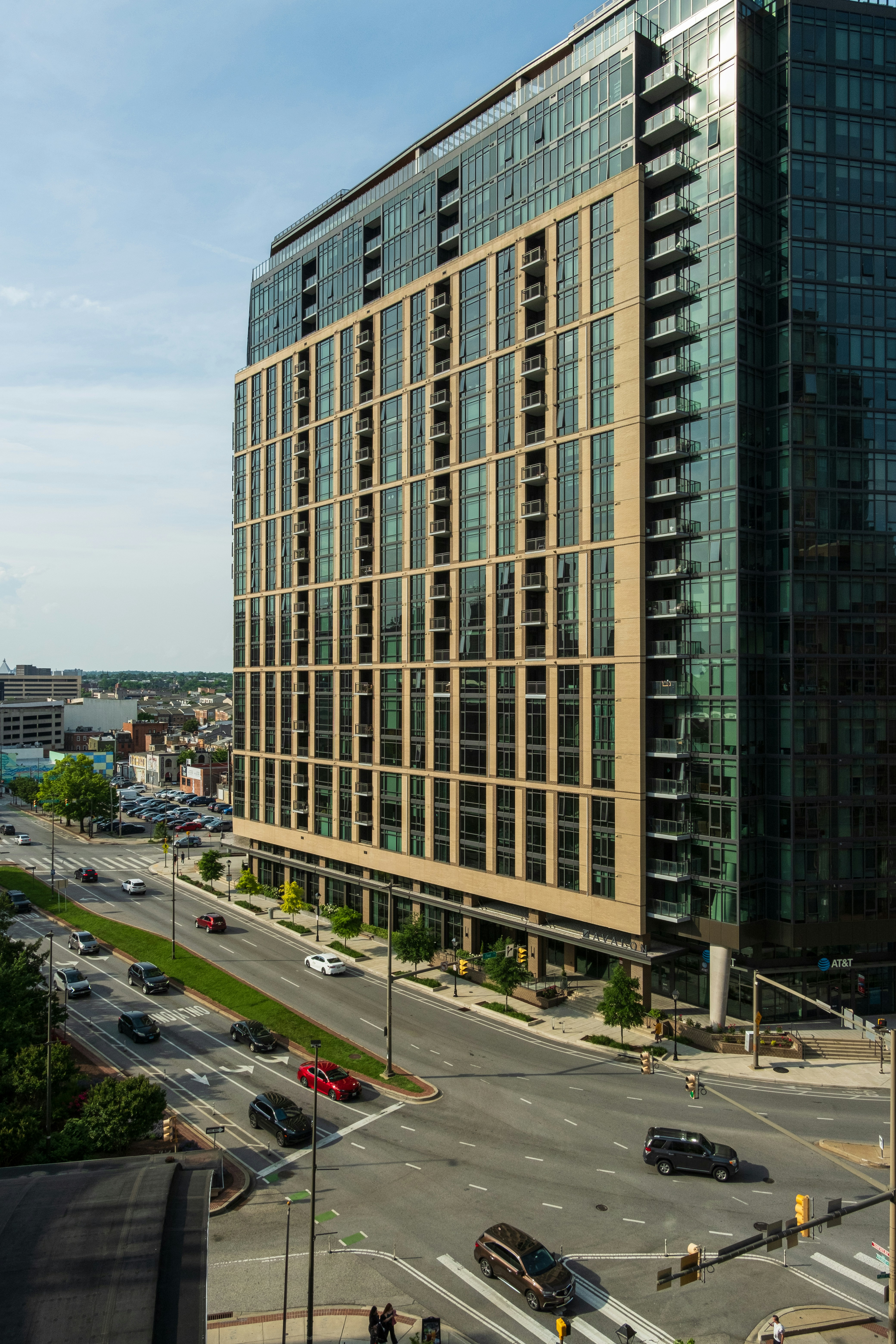 a very tall building sitting next to a street