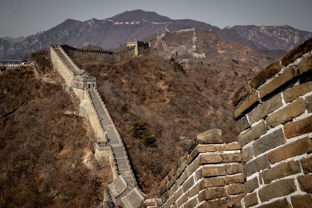 Great Wall of China with visitors walking along the ancient structure