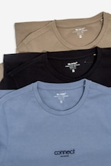 a group of three men's t - shirts sitting next to each other