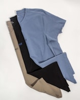 a group of three men's underwear laying on top of each other