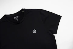 Black t-shirt with a small chest mark