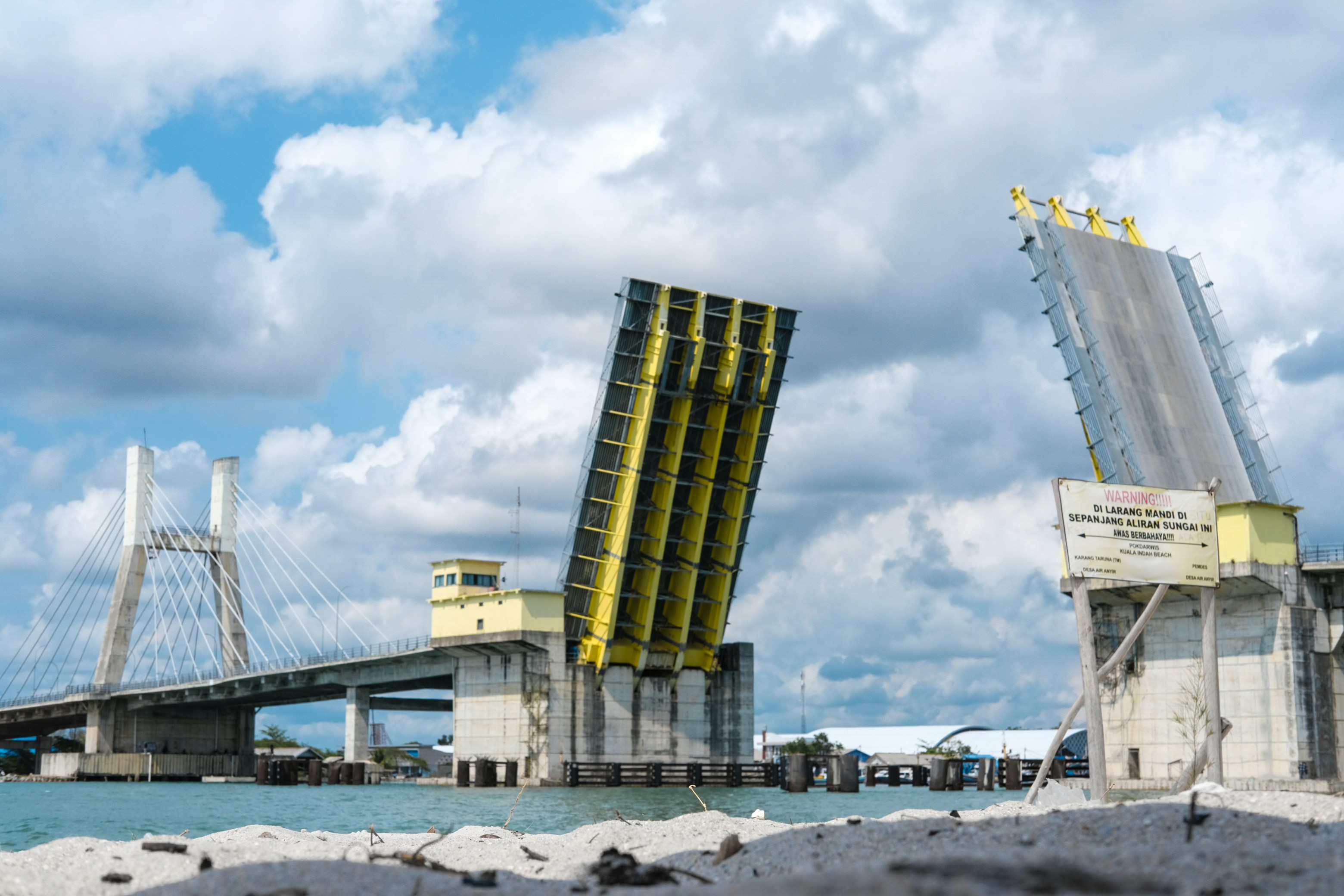 a bridge that is next to a body of water