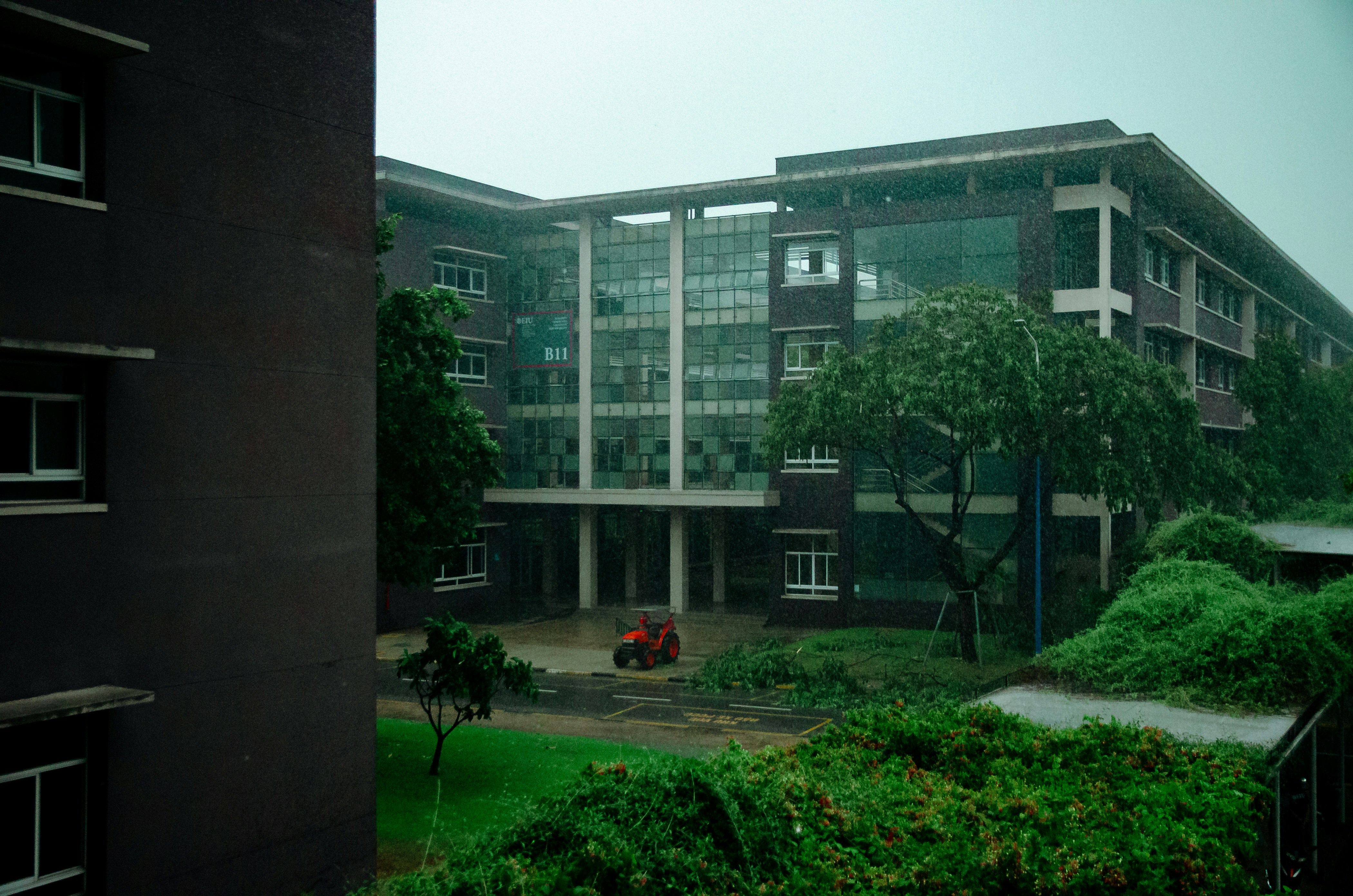 a building with a green lawn in front of it