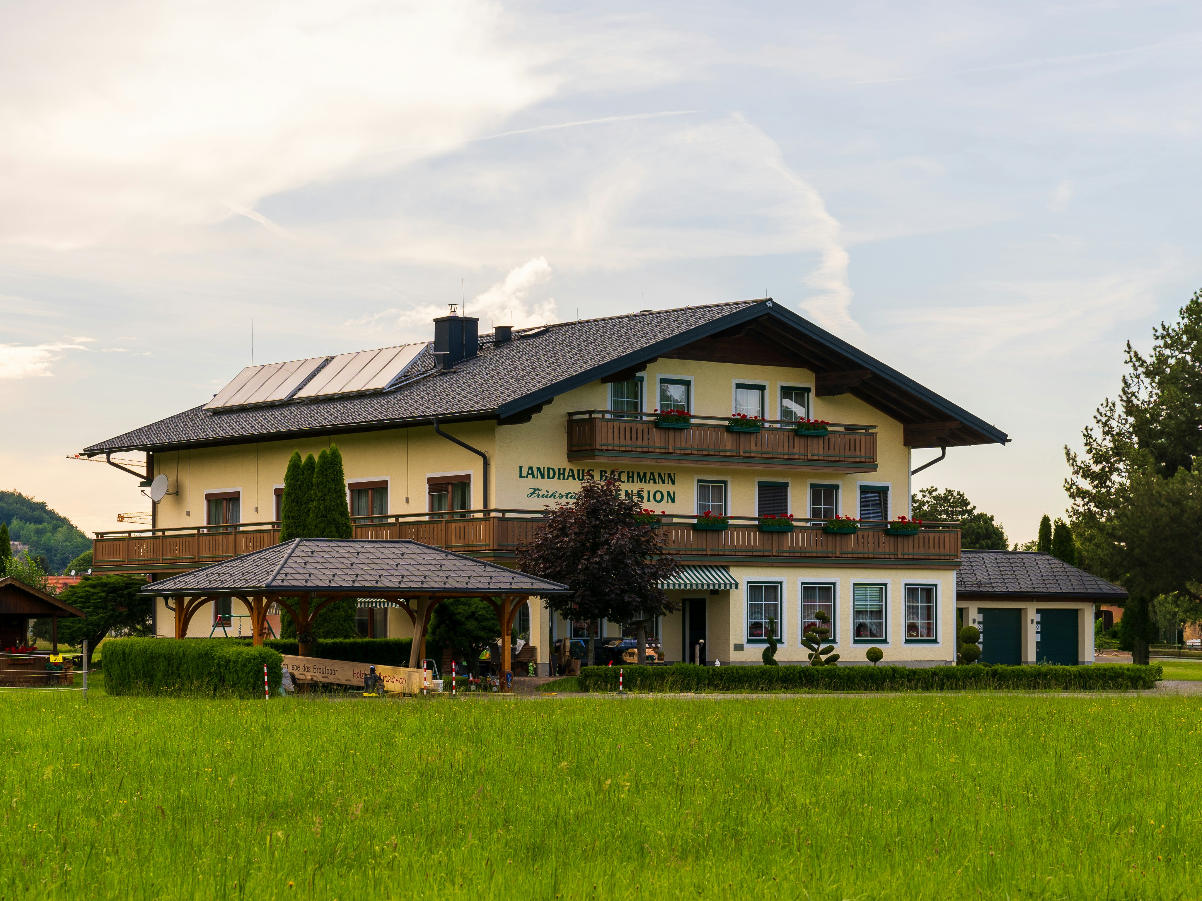 a house with a solar panel on the roof