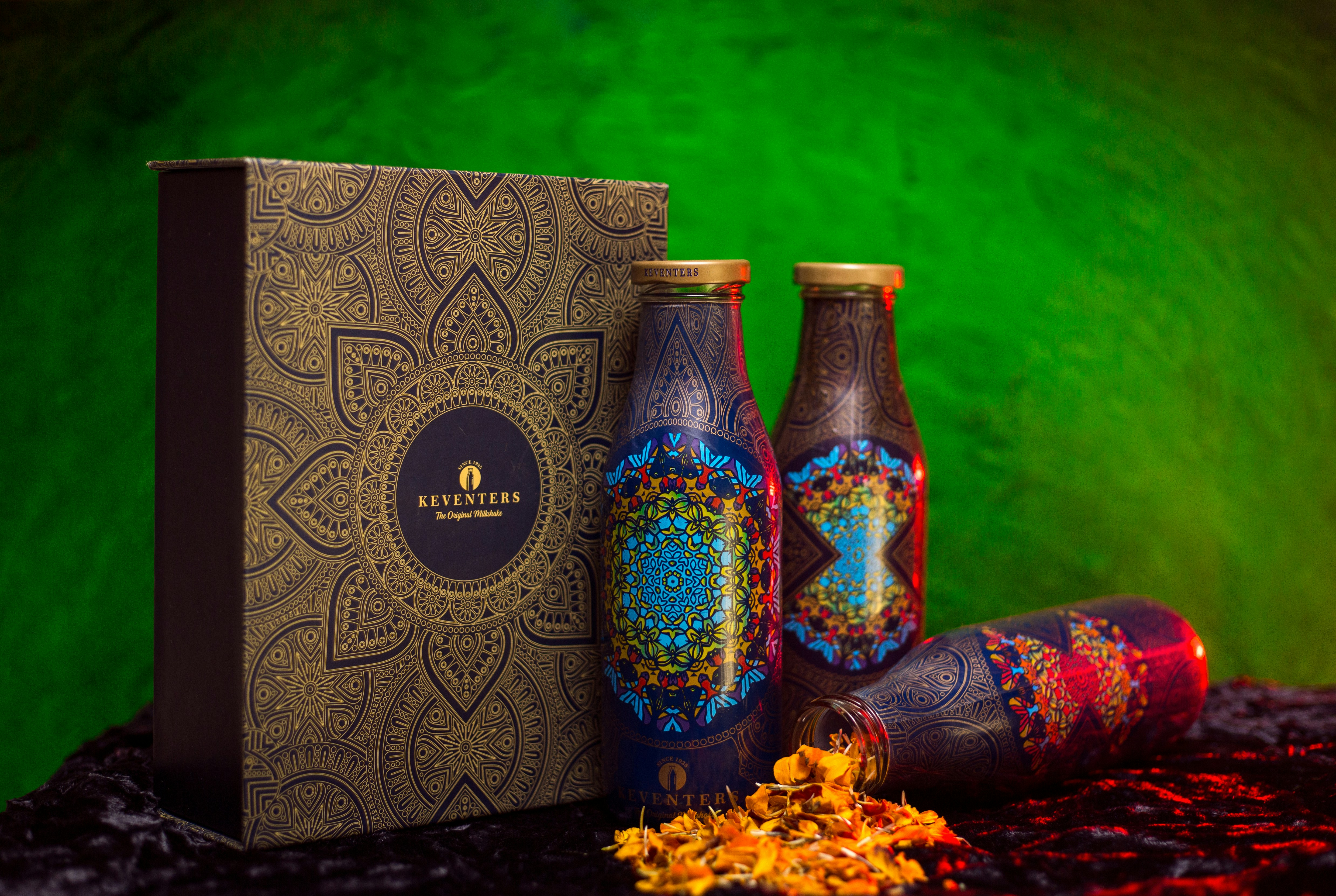 a couple of bottles that are next to a box