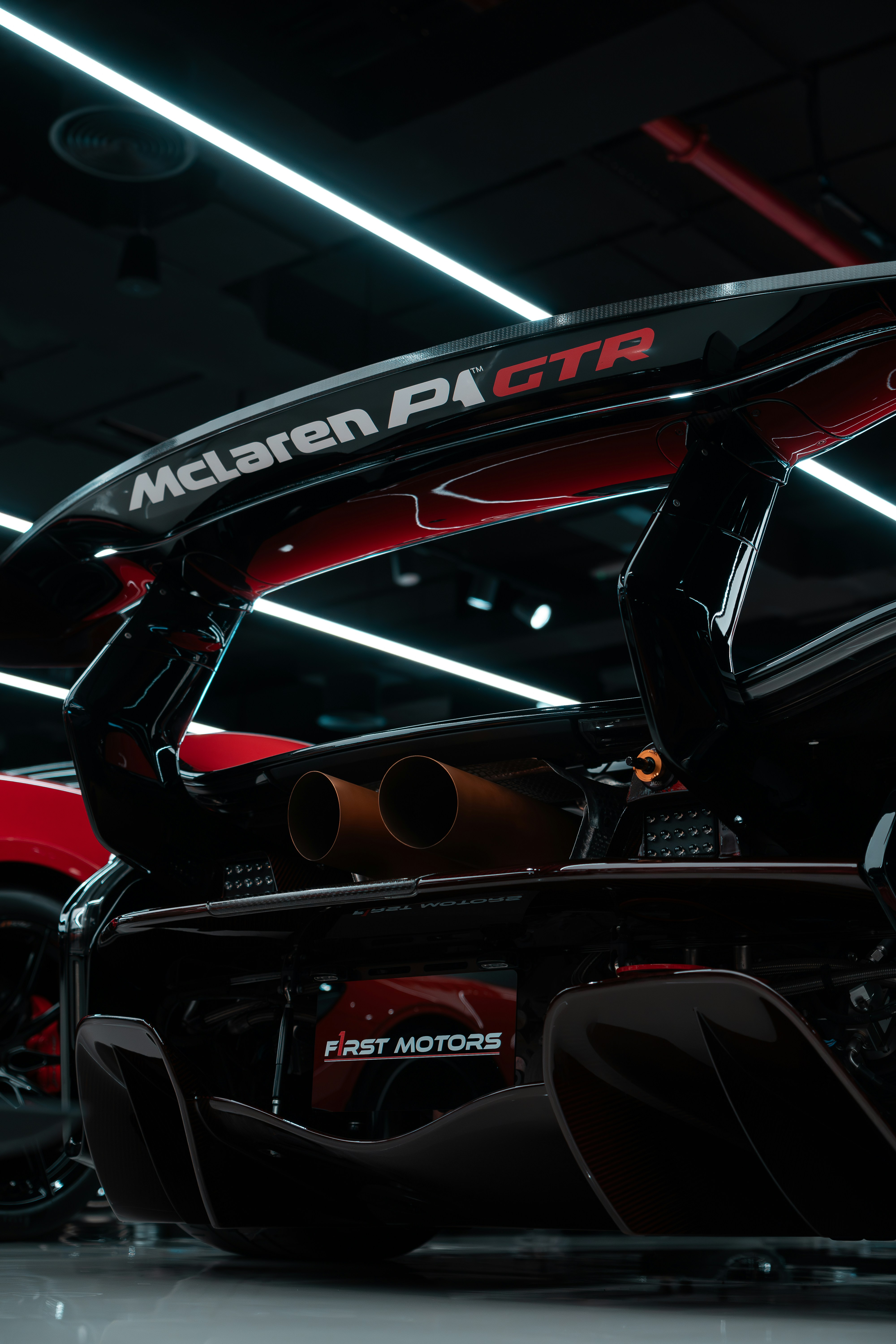 a close up of a car in a showroom