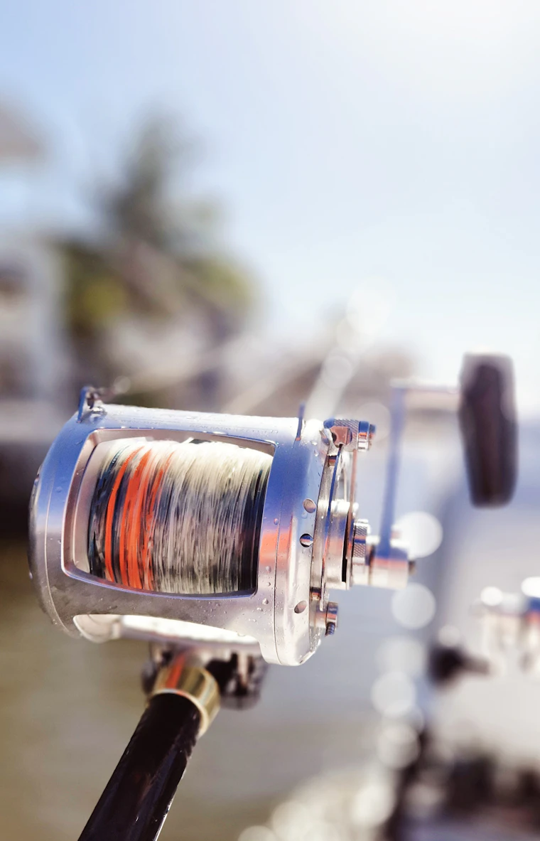 Detail of a loaded fishing reel spool on board a boat
