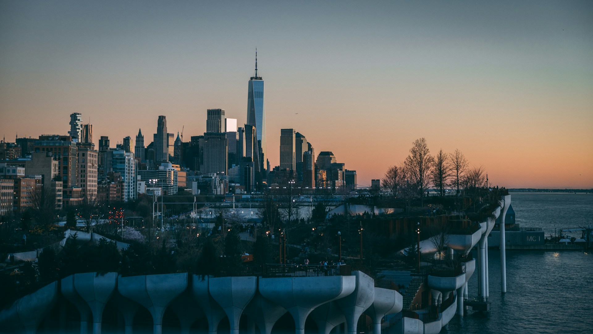 a view of a city skyline at sunset