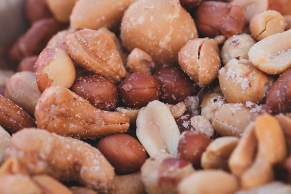 A pile of nuts with powdered sugar on top