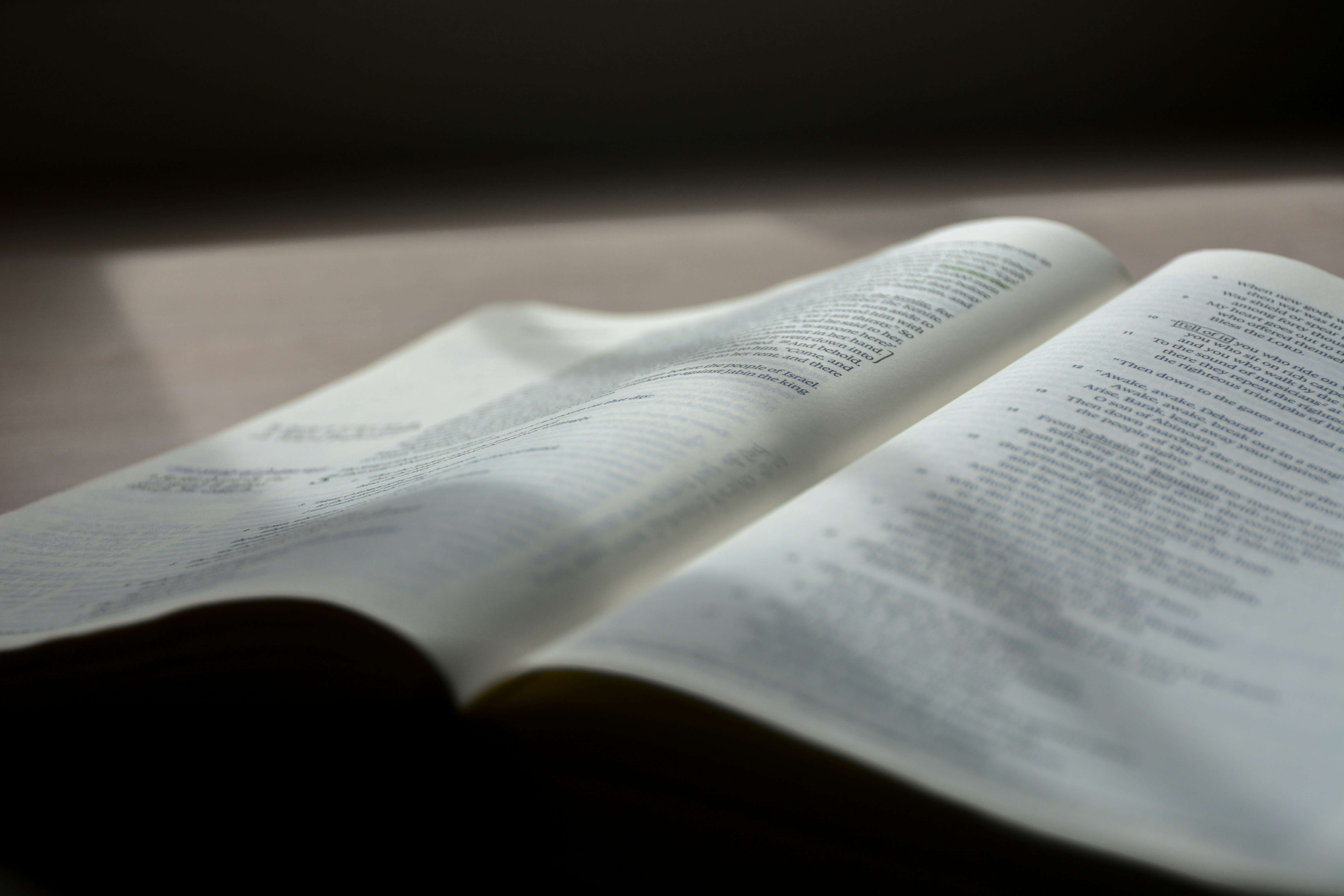 an open book sitting on top of a table