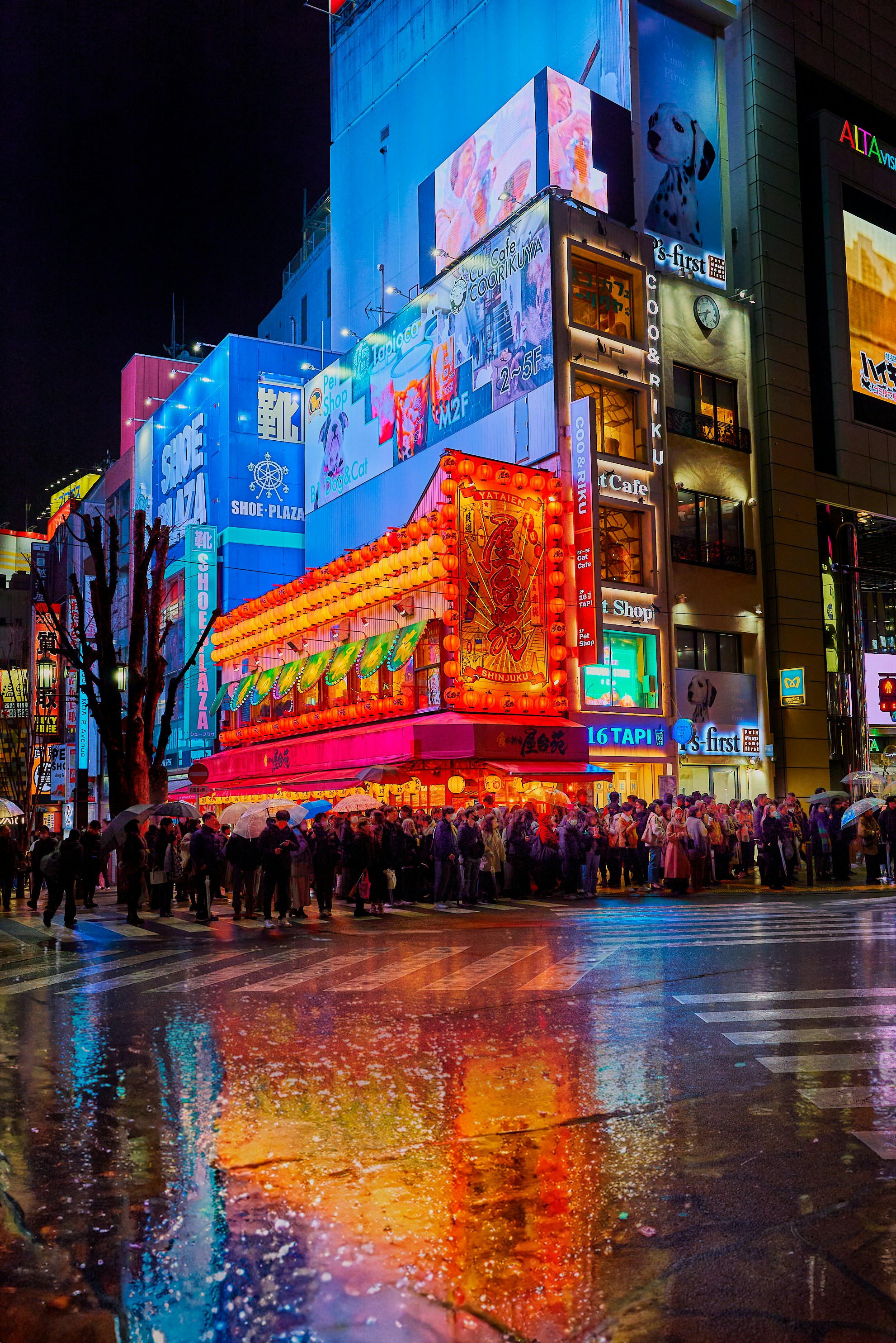a group of people standing in front of a building