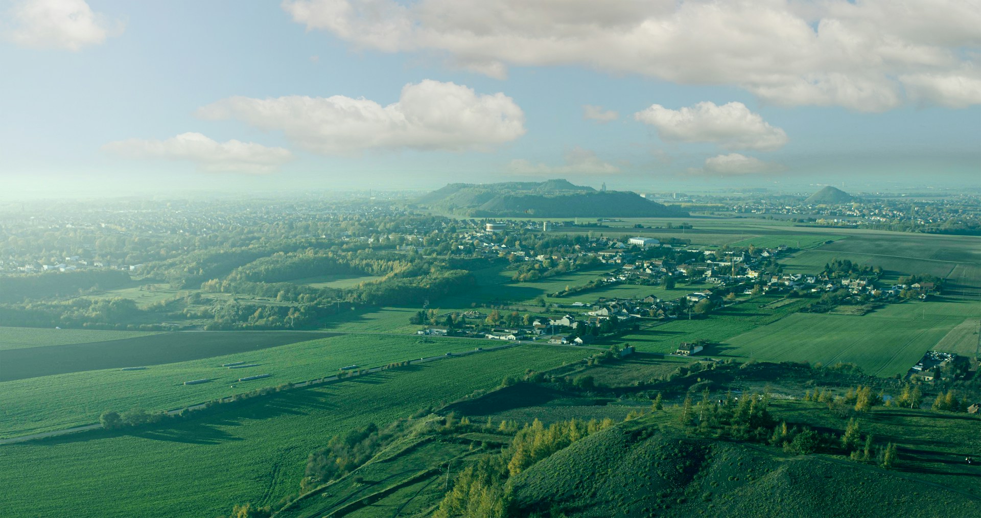 an aerial view of a small town in the distance