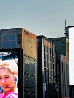 a billboard with a picture of a woman on it
