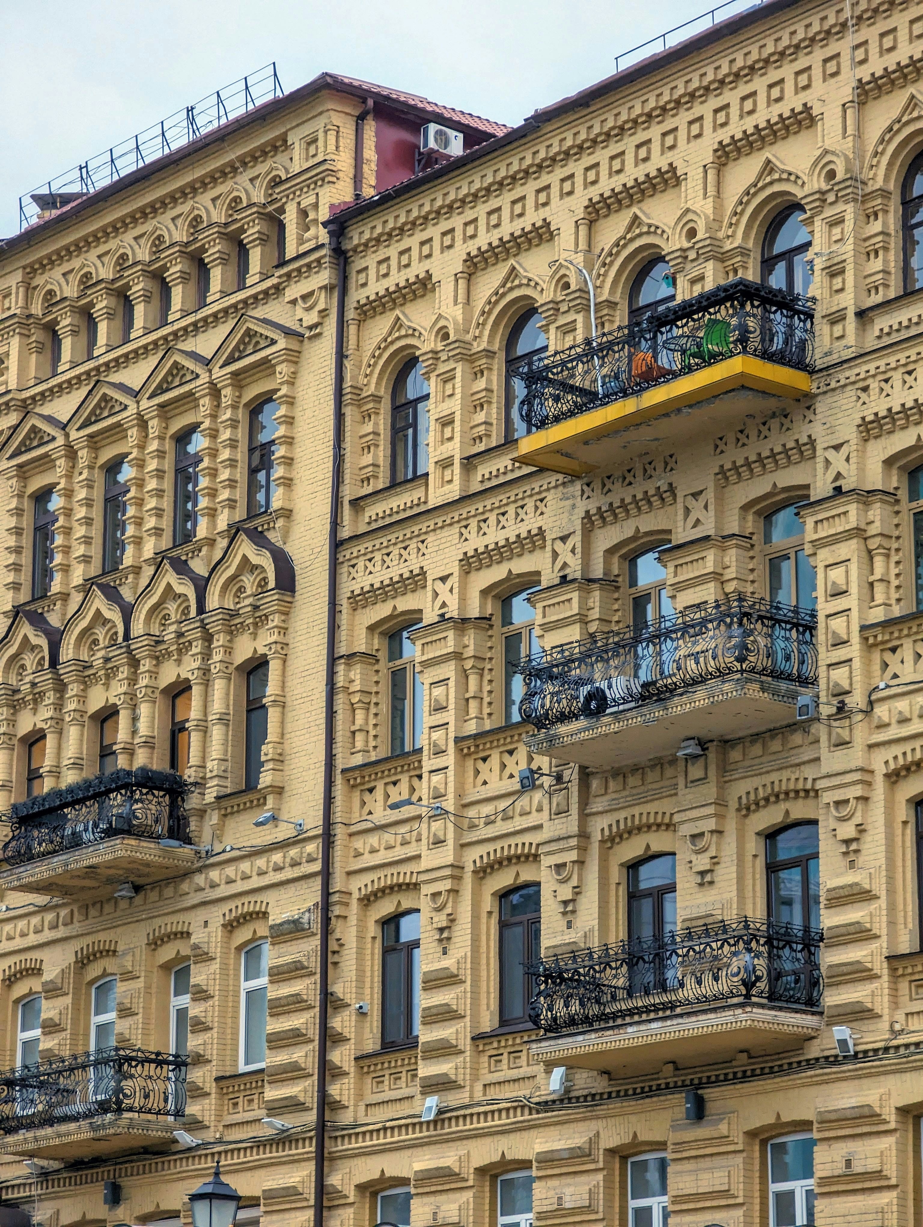 a very tall building with lots of windows and balconies