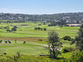 a group of people on a golf course