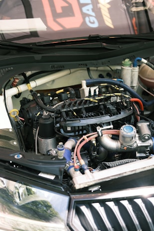the engine compartment of a car with the hood open